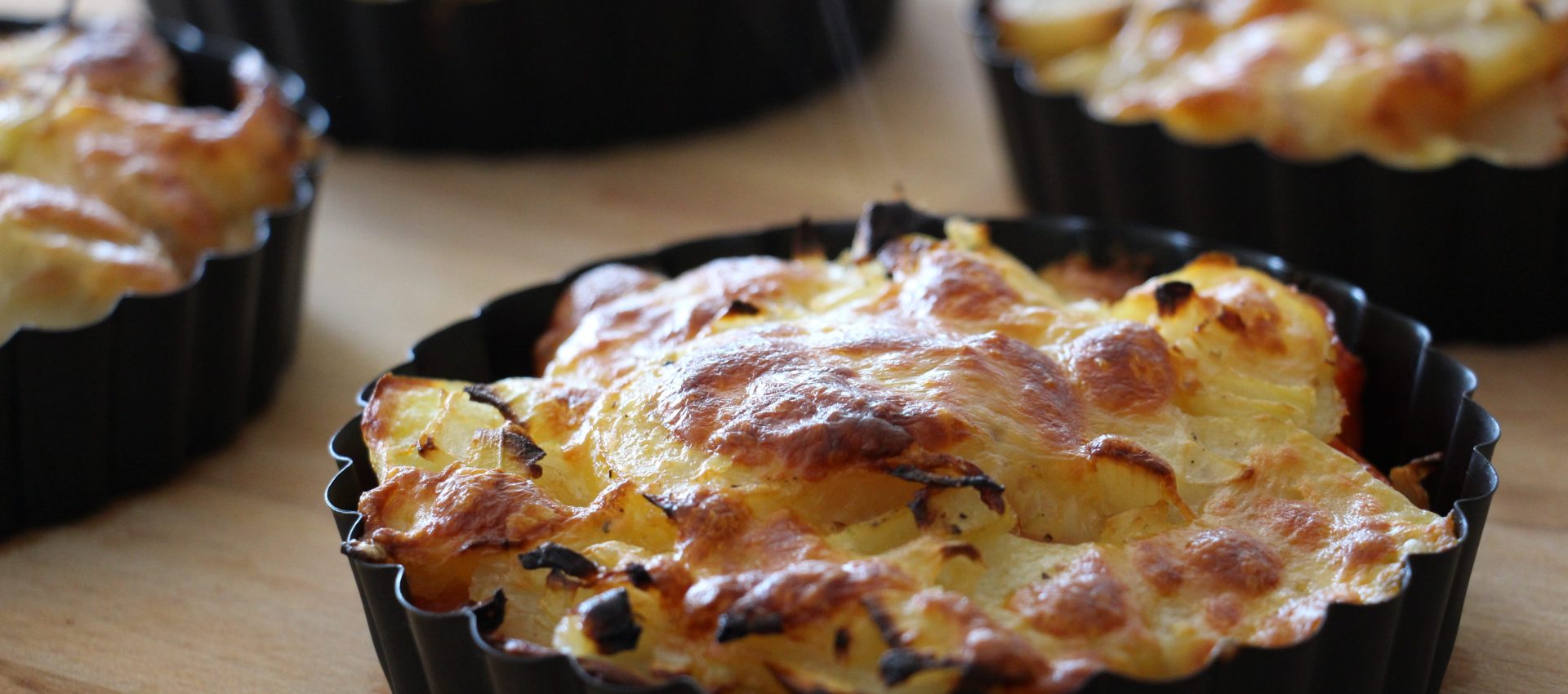 Gratin de pommes de terre, tomates et mozzarella